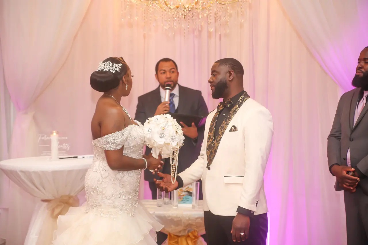 Wayde officiating a Black couple's elegant wedding ceremony