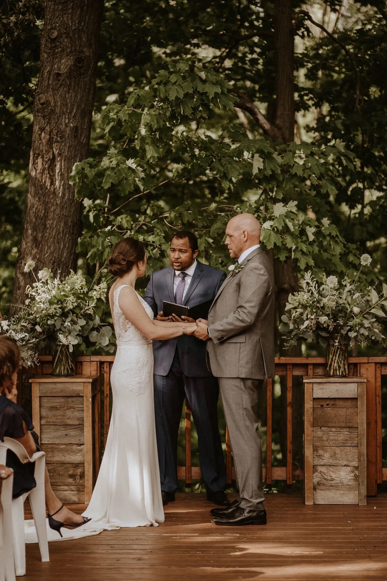 Wayde officiating an intimate woodland wedding ceremony